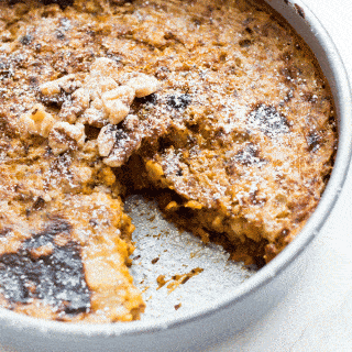 up close shot of baked oatmeal in a metal cake pan