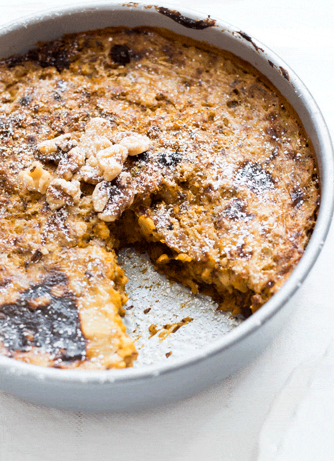 up close shot of baked oatmeal in a metal cake pan