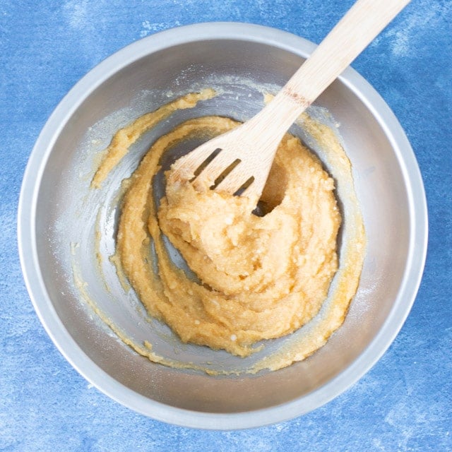 Batter for coconut flour chocolate chip cookies in a stainless steel bowl