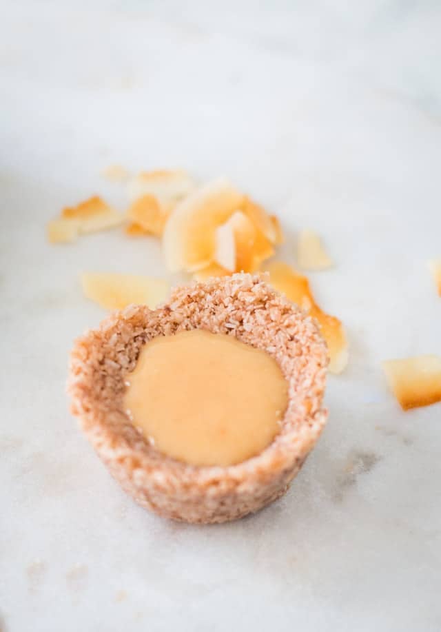 Fresh coconut butter spooned into the coconut butter bites