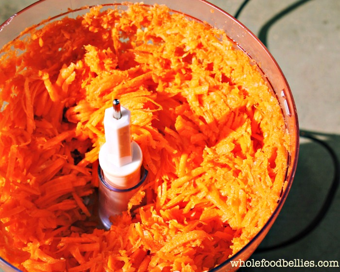 shredded carrots using the grater attachment in a food processor