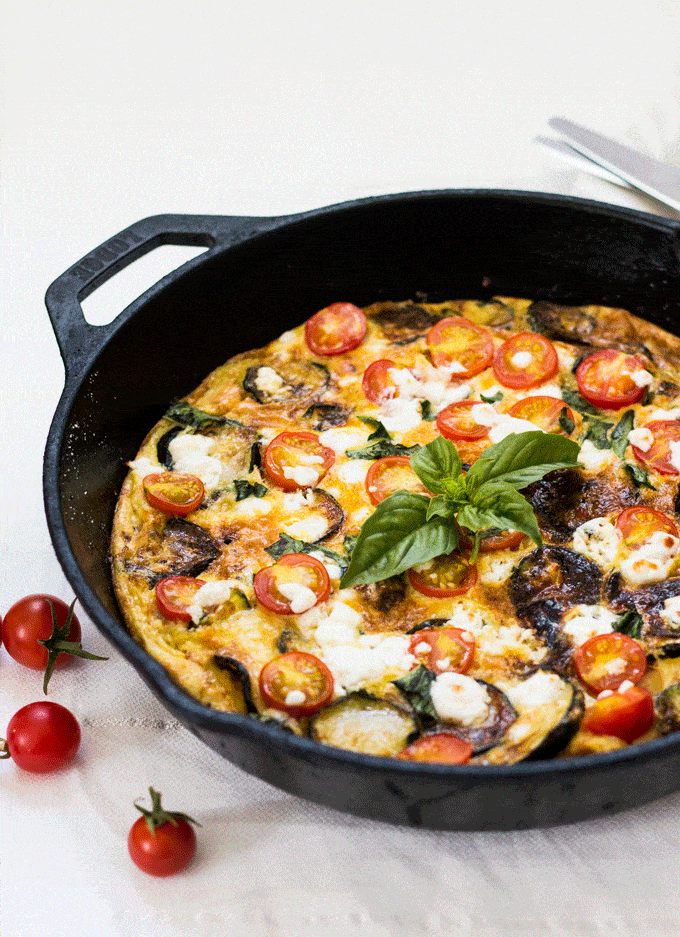 a frittata cooked in a black cast iron skillet