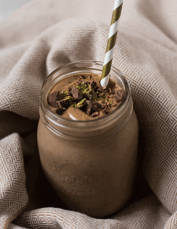 matcha green tea smoothie in a glass mason jar