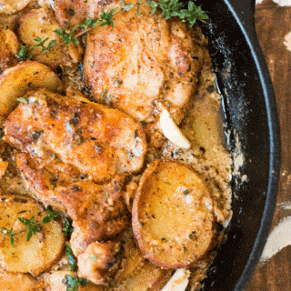 One Pan Creamy Garlic Chicken with Potatoes and Fresh Garden Herbs