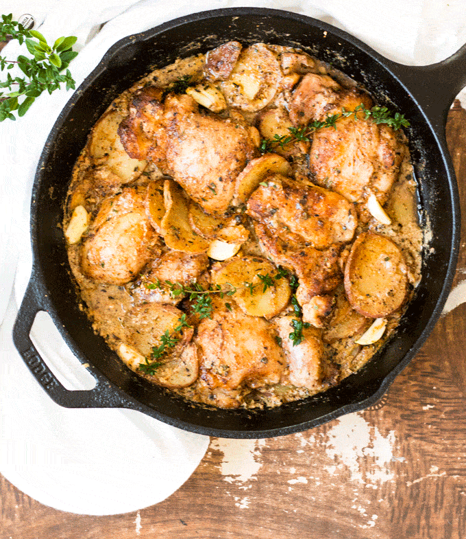 One Pan Creamy Garlic Chicken with Potatoes and Fresh Garden Herbs