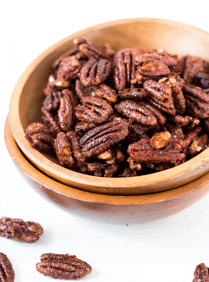 Sweet and Spiced Pecans in a brown wooden bowl