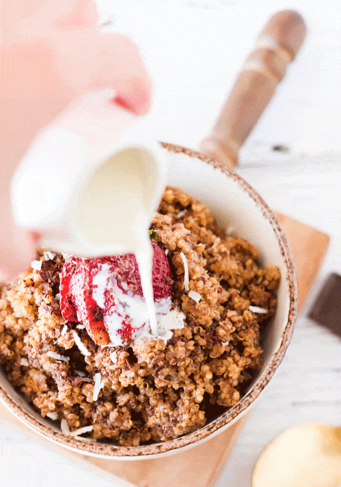 Instant Pot Breakfast: Chocolate Covered Strawberry Breakfast Quinoa with fresh milk being poured into the bowl