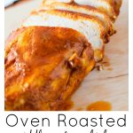 Oven Roasted Middle Eastern Chicken Breasts sliced on a wooden chopping board