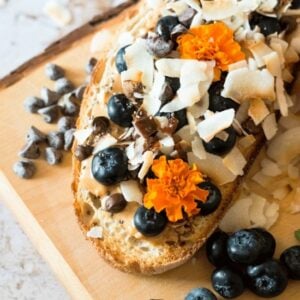 almond butter coconut toast with chocolate drizzle