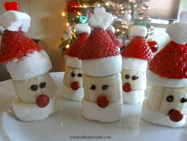 santa party poppers made with banana strawberry and marshmallows