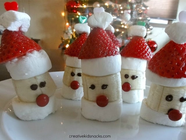 santa party poppers made with banana strawberry and marshmallows