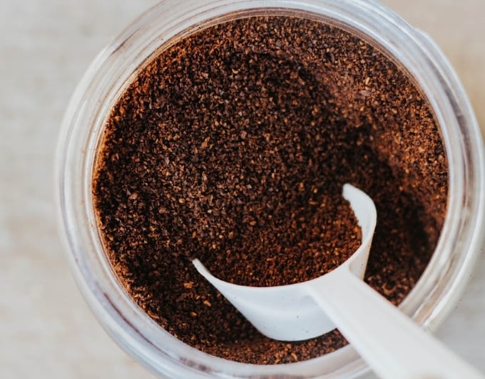 used coffee grounds being used to reduce food waste