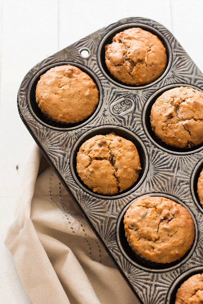 Protein Rich Carrot Cake Muffins in an ornate muffin tray