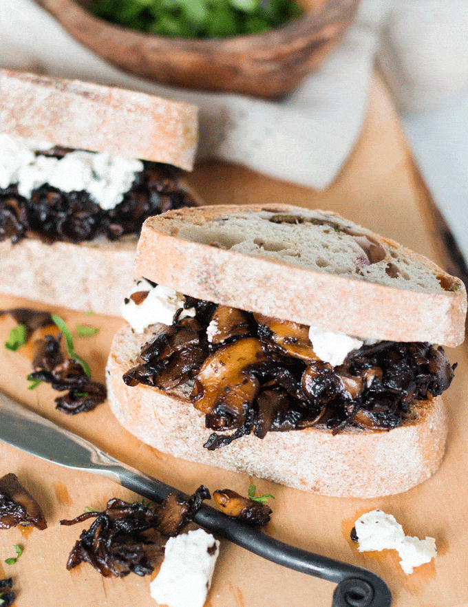 immune boosting mushrooms on toast on a wooden board