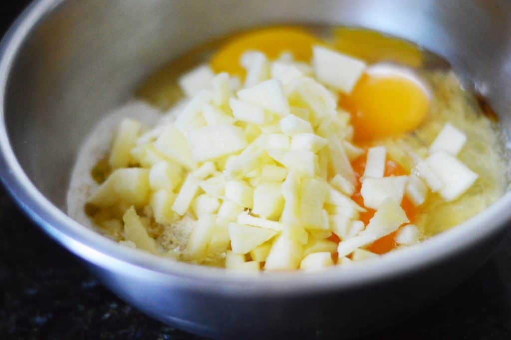 Ingredients for grain free muffins added to a bowl