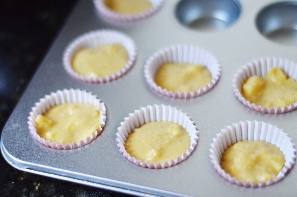 Mini muffin batter in mini muffin tray.