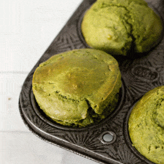 green muffins in a vintage muffin tray