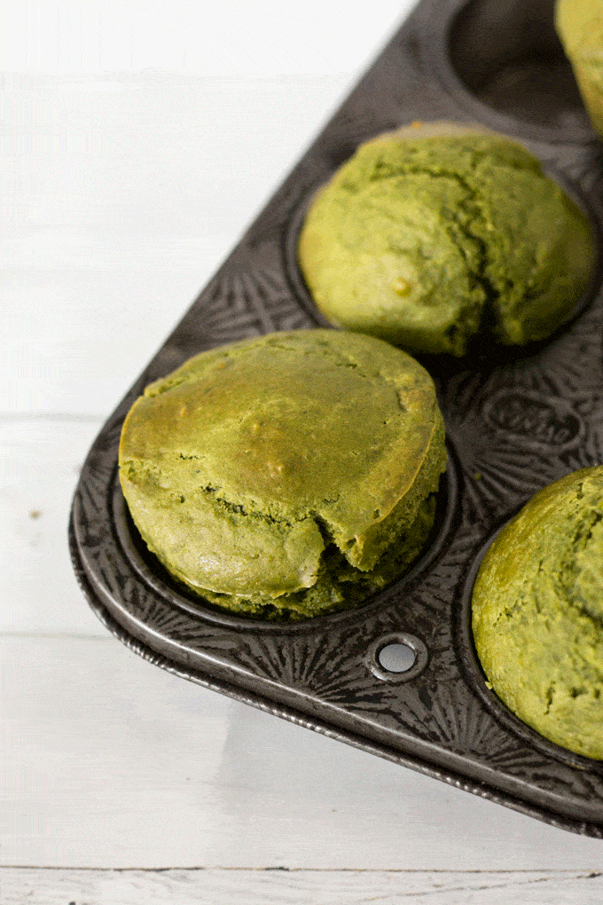 green muffins in a vintage muffin tray