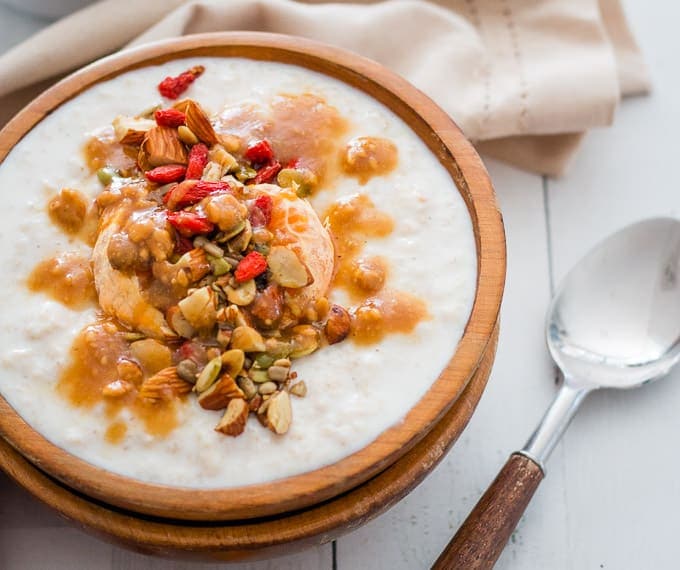 Creamy Mandarin and Pumpkin Seed Winter Porridge With Almond Milk