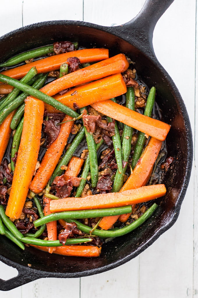 Sauteed Green Beans and Carrots in a cast iron skillet