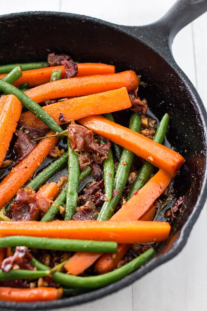 Sauteed Green Beans and Carrots in a cast iron skillet