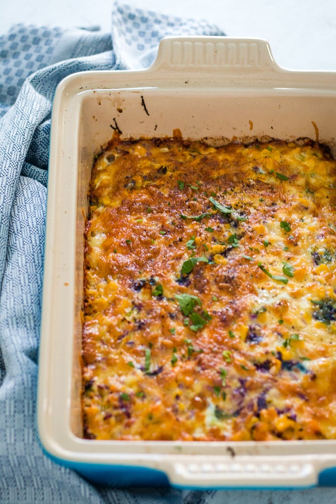 rainbow veggie slice in a blue casserole dish