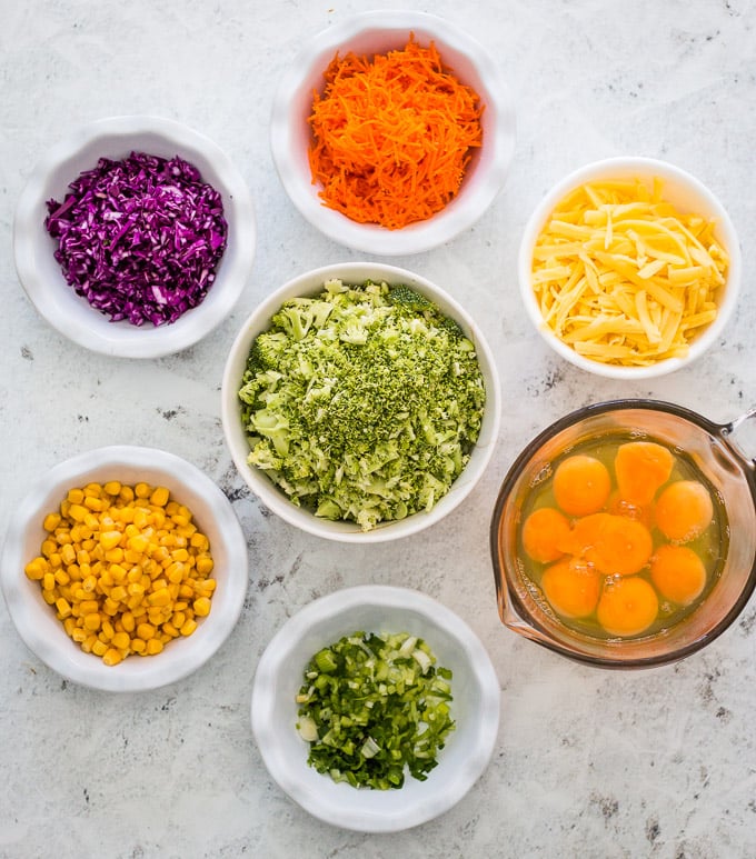 Ingredients needed for rainbow veggie slice arranged in separate bowls