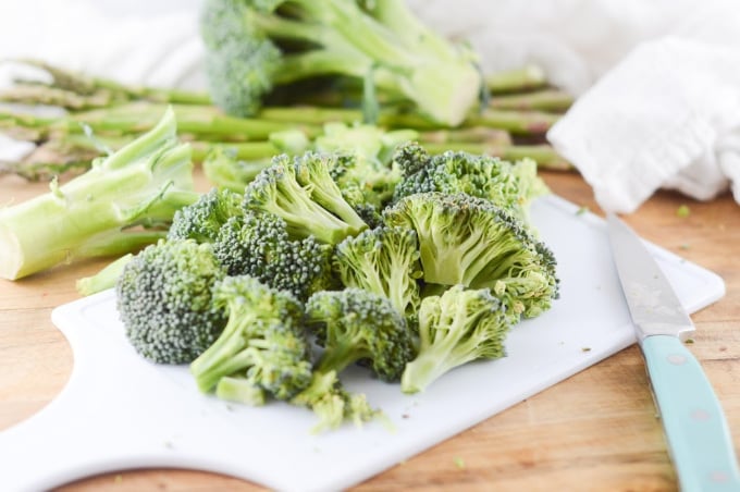 Raw broccoli cut into even florets