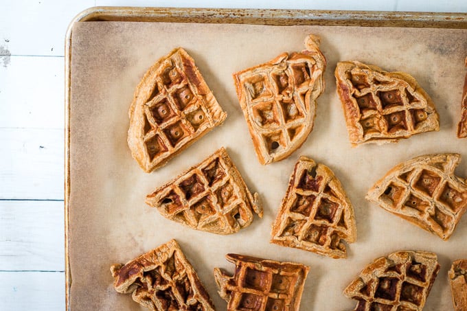 cooked waffles lying on a baking tray