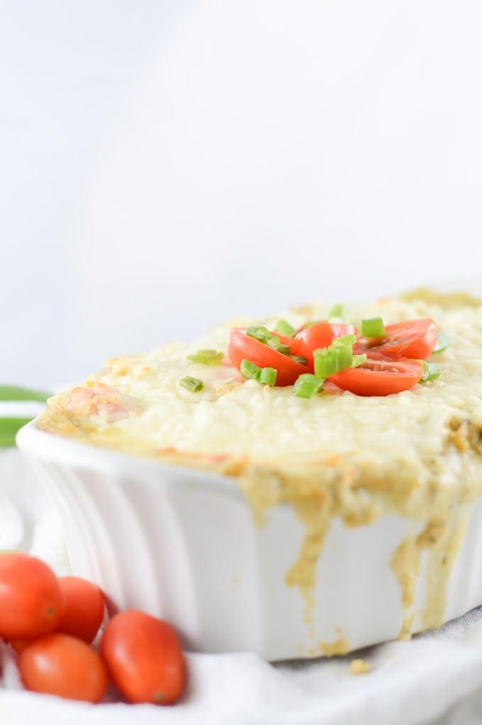 keto pesto cheese dip recipe in a white casserole dish