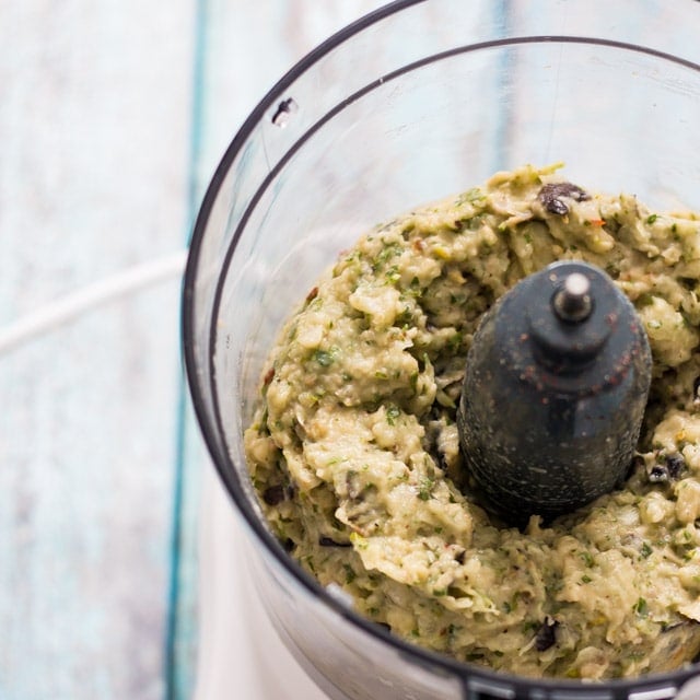 food processor with a greenish mixture