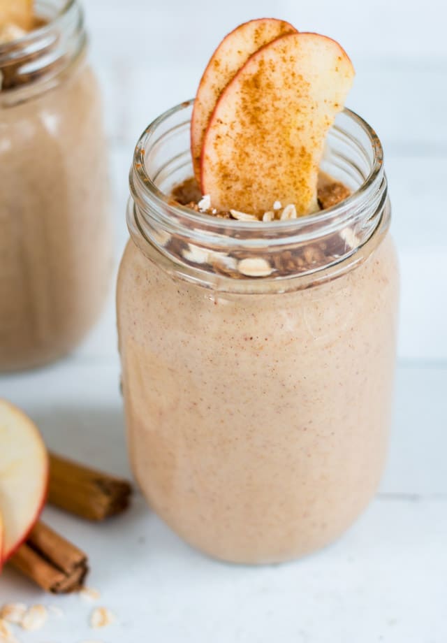 Up close shot of an apple smoothie in a glass mason jar