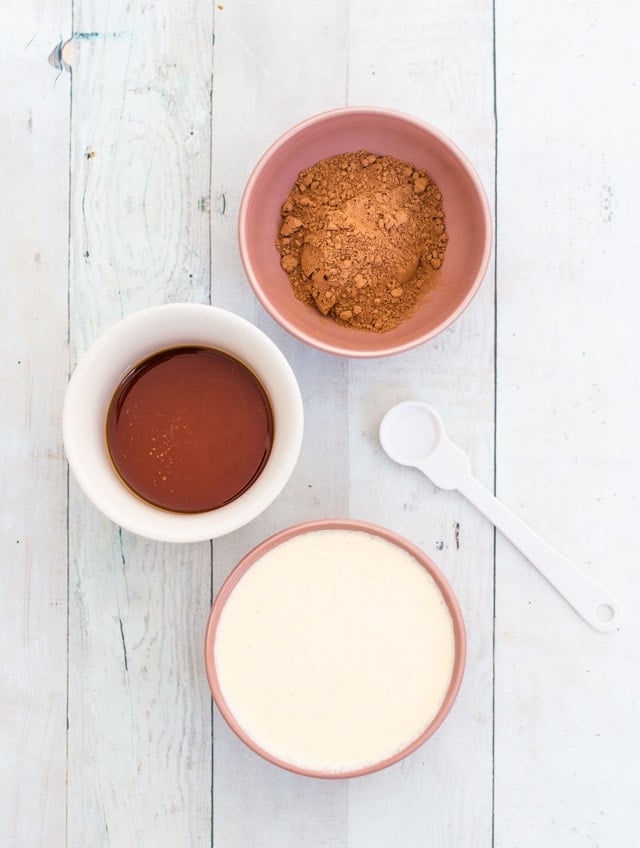 ingredient shot including maple syrup, cacao powder, cream and peppermint extract