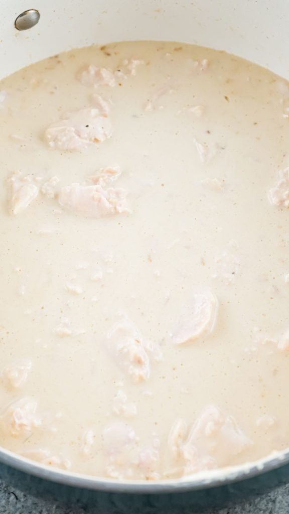 creamy alfredo pasta sauce in a large pot