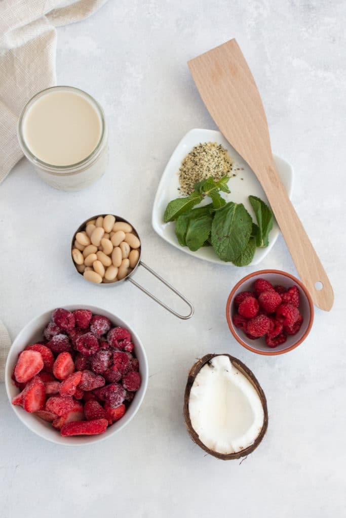 Overhead shot of ingredients for red berry smoothie