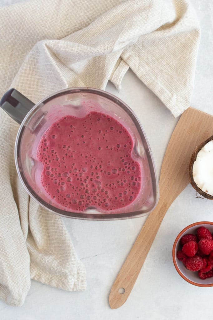 Overhead shot of ingredients for red berry smoothie