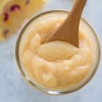 overhead shot of lemon curd in a glass jar