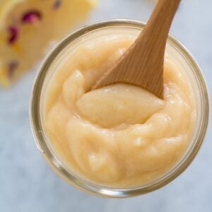 overhead shot of lemon curd in a glass jar