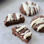 Almond Flour Cookies served with a white chocolate drizzle and some white sprinkles