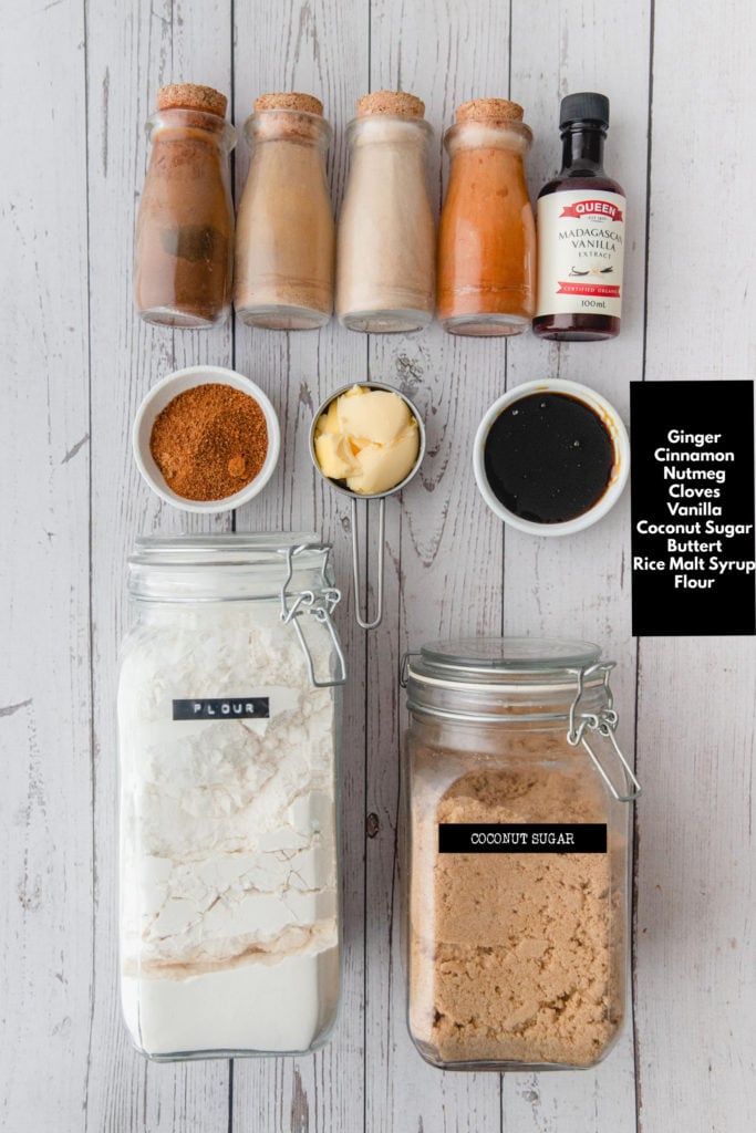 Overhead ingredient shot of ingredients needed for homemade gingersnap cookies without molasses