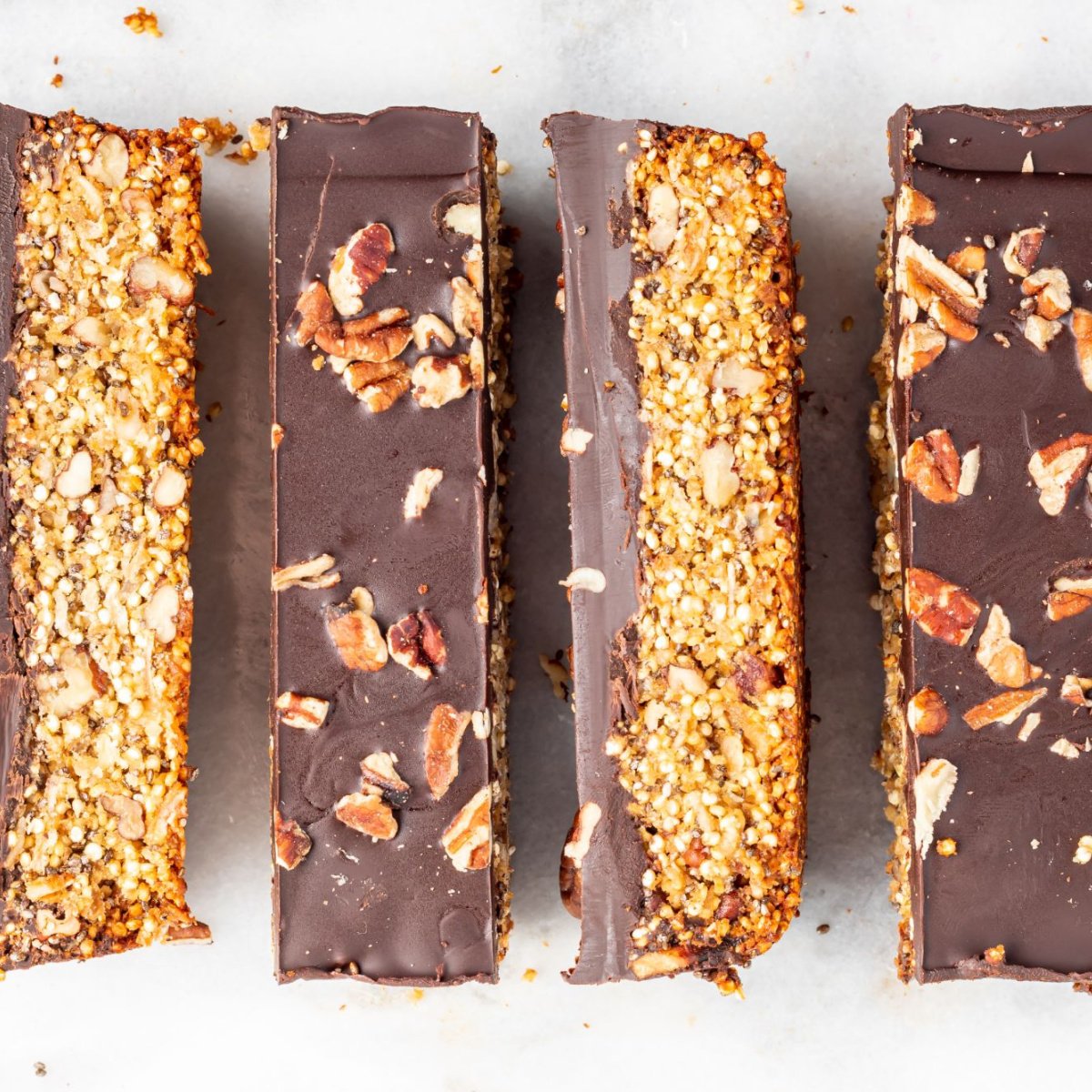 Overhead shot of a superfood bar topped with chocolate and nuts