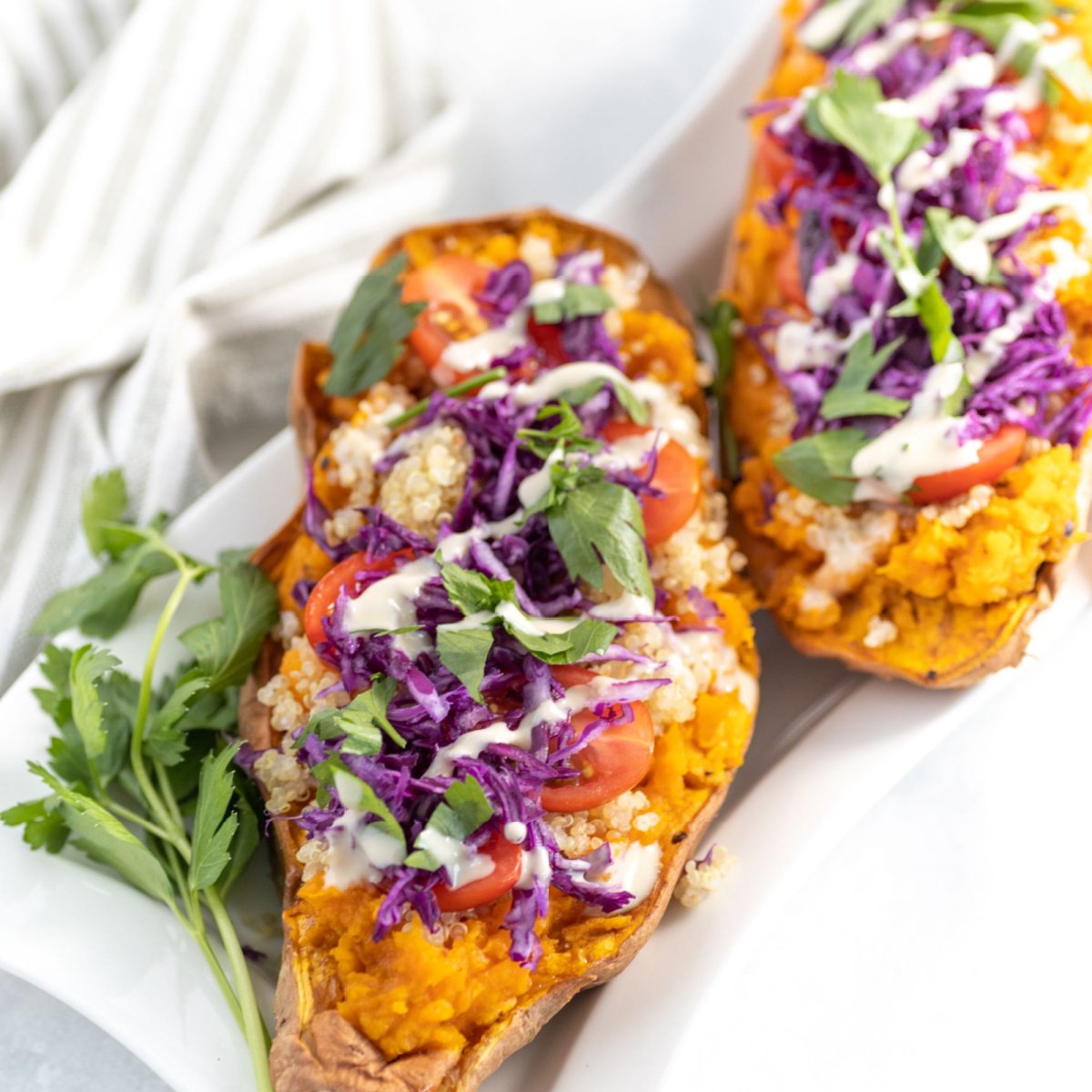 oven roasted sweet potatoes stuffed with a quinoa and cabbage salad
