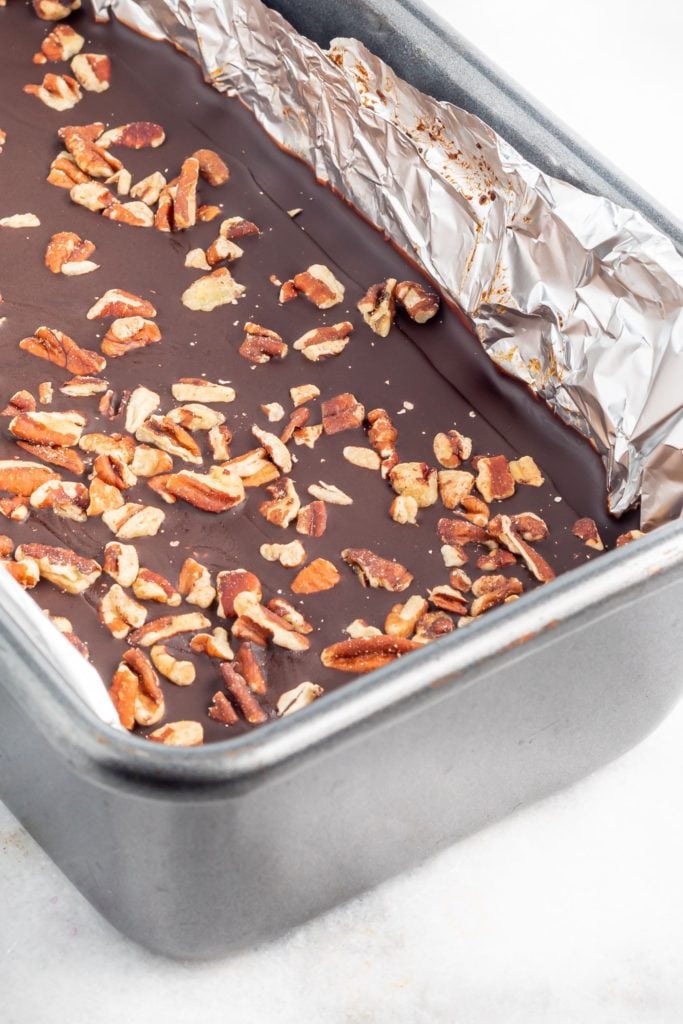 chocolate and nut bar in a lined loaf tin