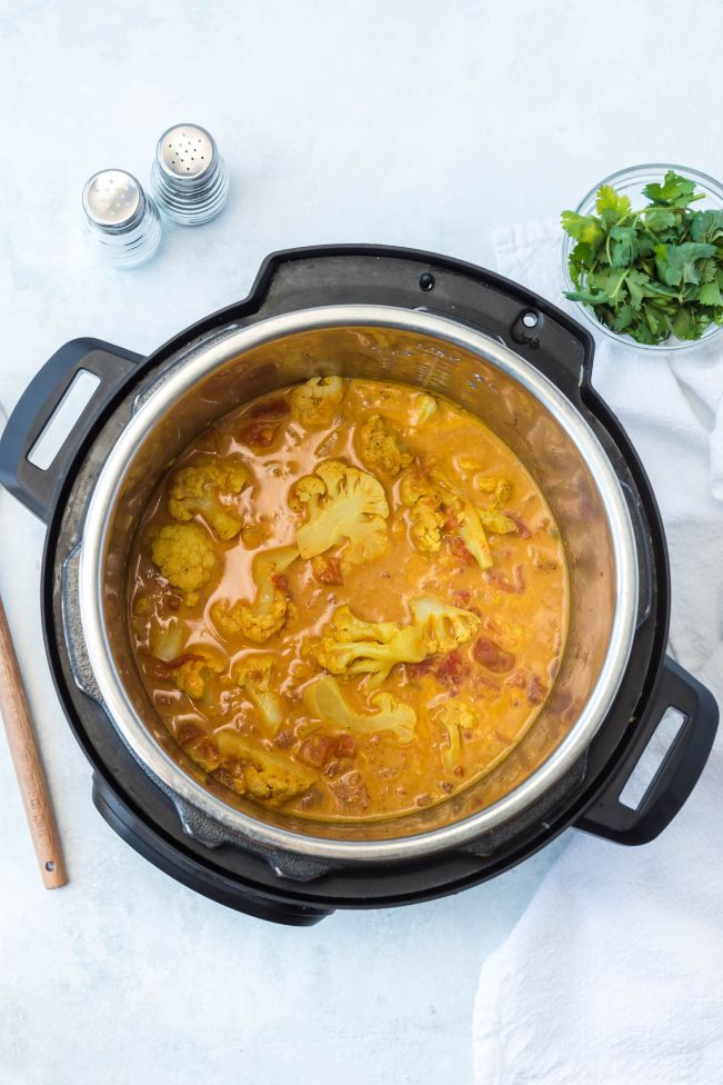 Cooked yellow curry in the pot of an instant pot