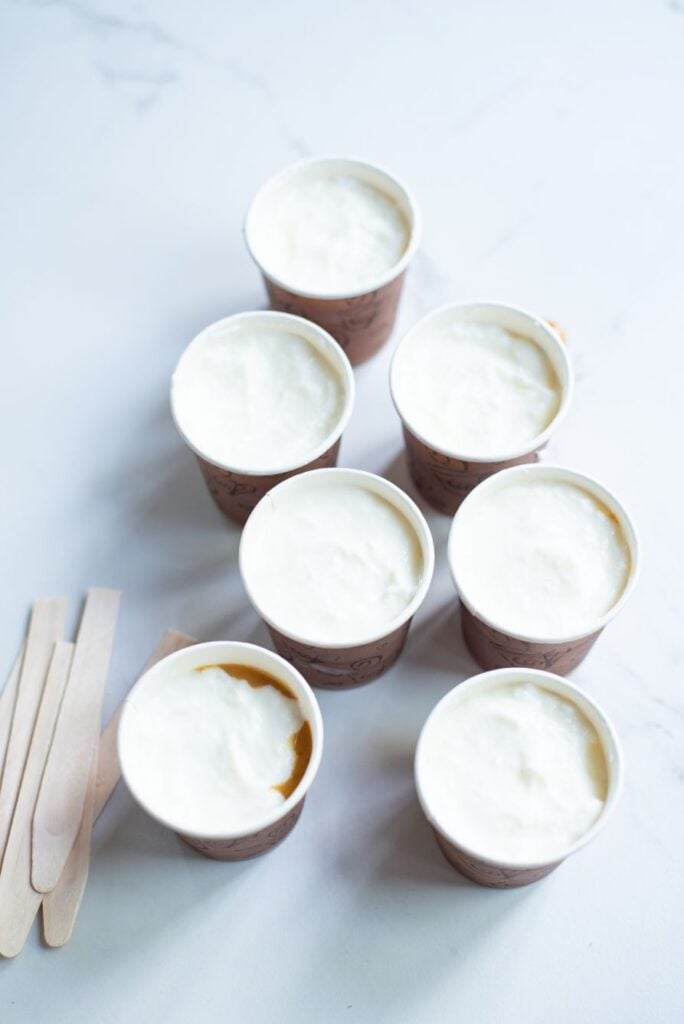 Add the coconut cream to the popsicle molds