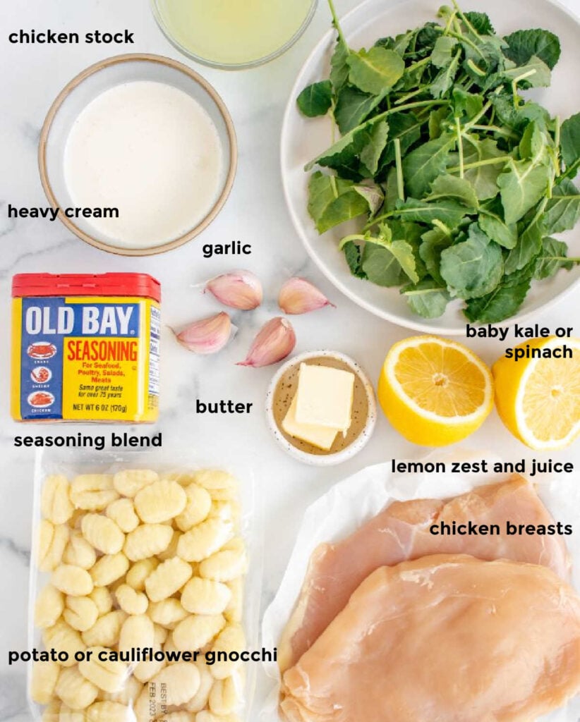 Overhead shot of ingredients required for a one pan chicken breast and gnocchi recipe