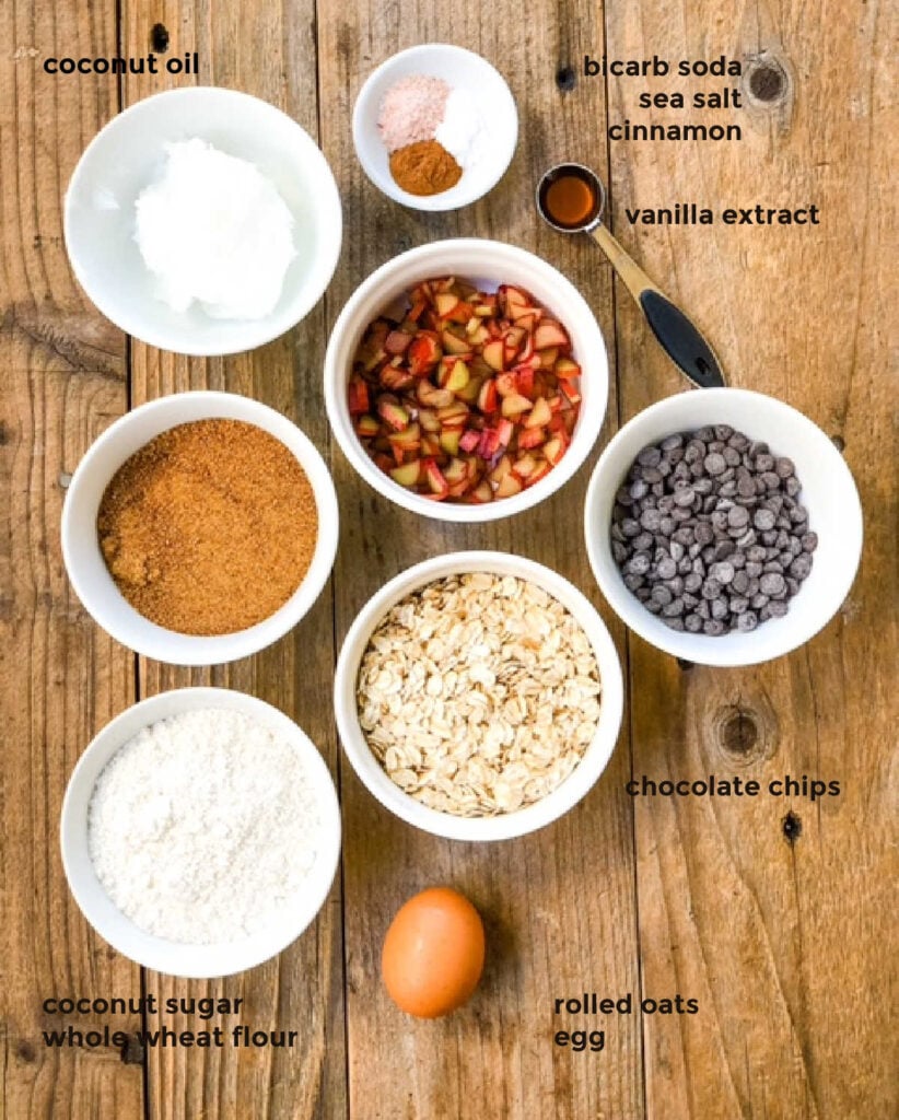 Overhead ingredient shot of cookie ingredients in separate white bowls