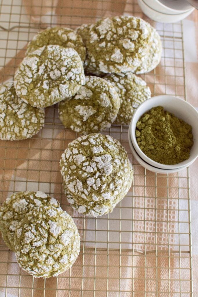 overhead shot of crinkle cookies cooling on a wire cooling rack.