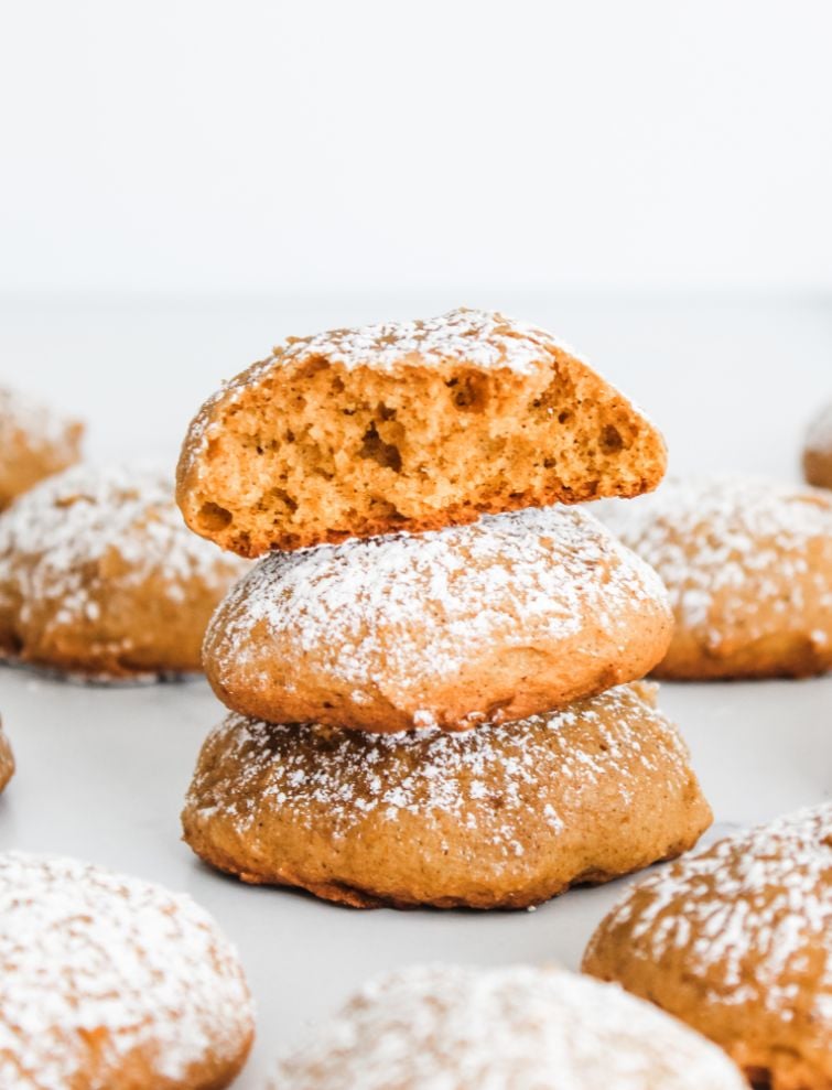 A stack of 3 cookies one on top of the other against a white background