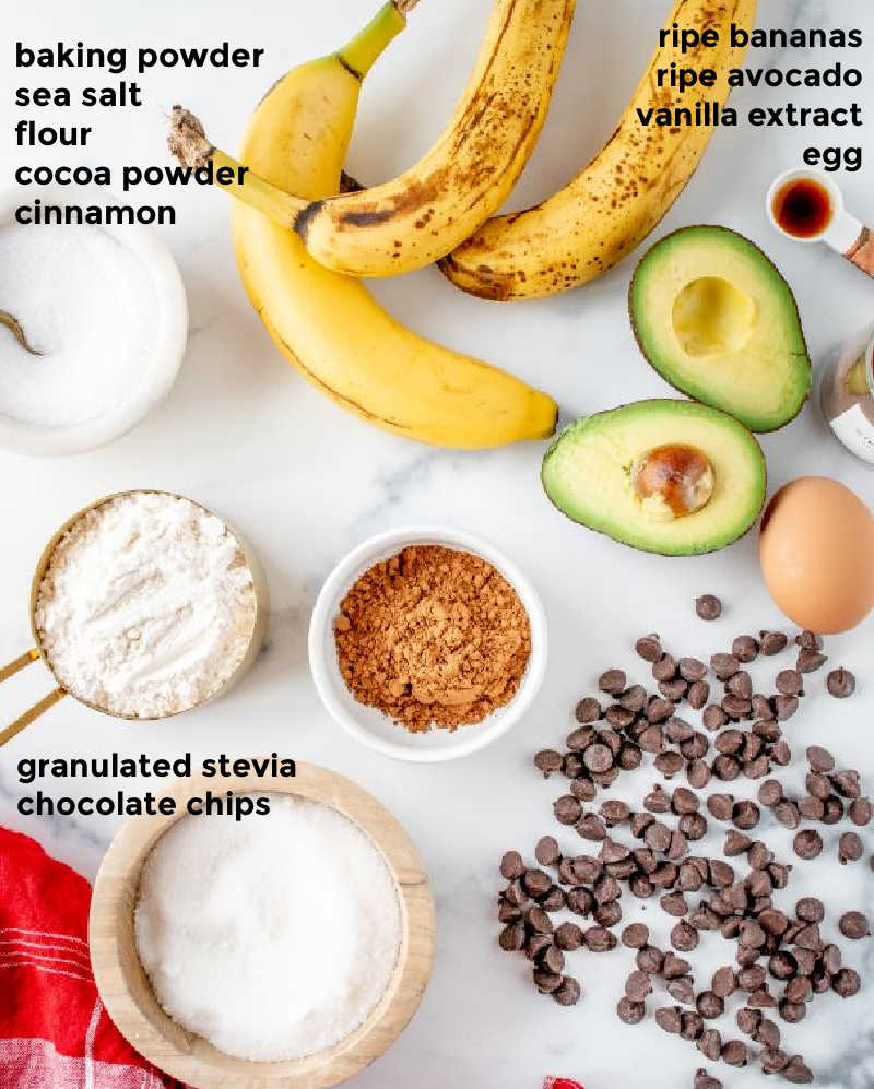 Overhead shot of ingredients required for a chocolate avocado loaf